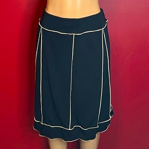 Brand new black with tan stripes a-line skirt. Size small